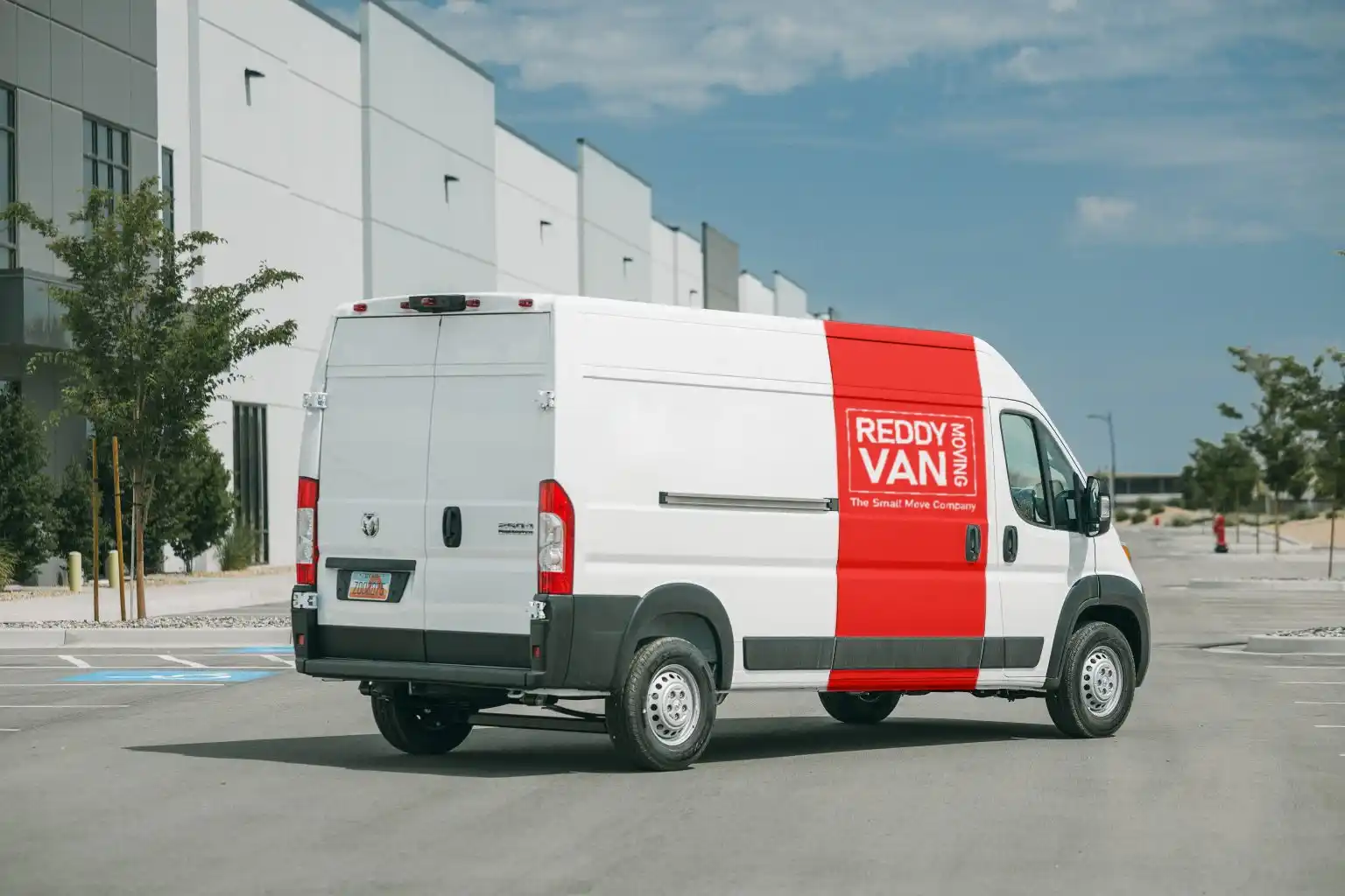 Reddy Van office movers in Tampa transporting furniture and business supplies to a local workspace.